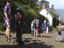 Starting our walk down the very steep, pebbled, High Street in Clovelly in search of coffee and the sea